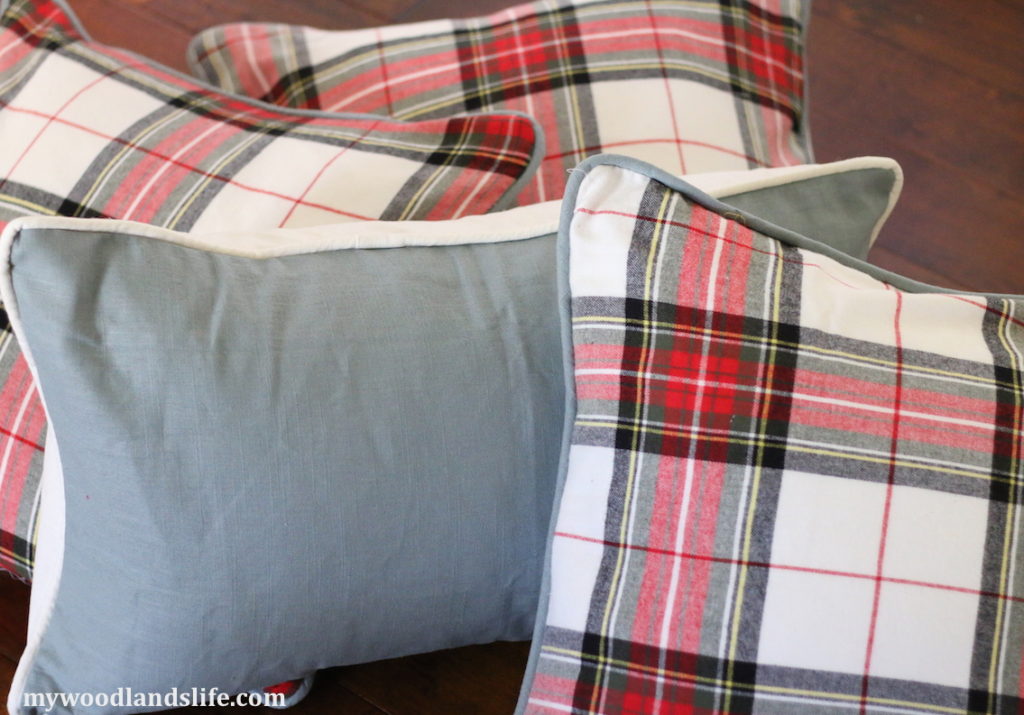 Plaid and light blue pillows for Christmas bedding