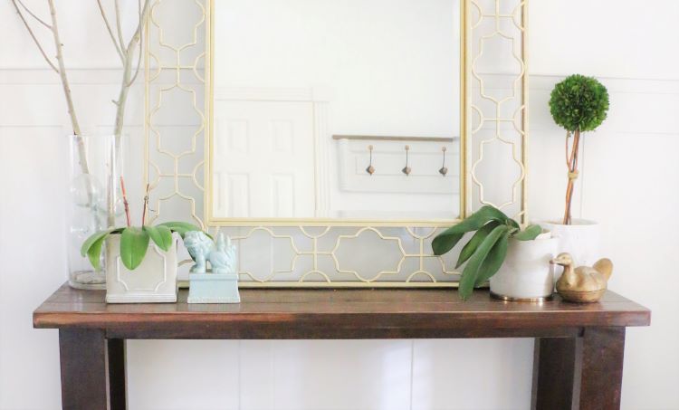 Modern traditional console table styling orchids brass gold
