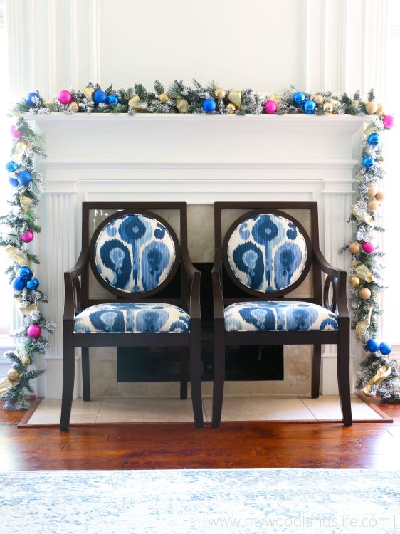 How to upgrade your inexpensive Walmart faux flocked garland with ornaments ribbon and live greenery to give it a designer look for less