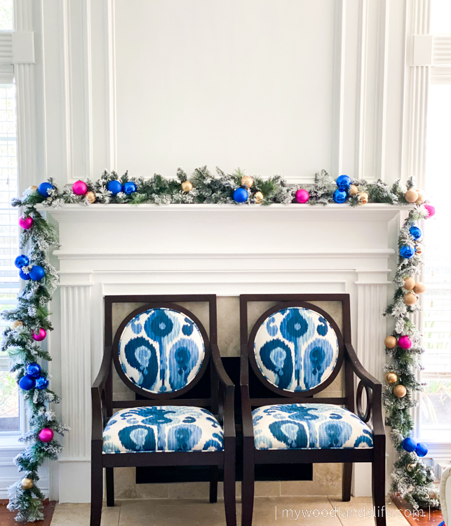 How to upgrade inexpensive Walmart faux flocked garland with ornaments ribbon and live greenery to give it a designer look for less