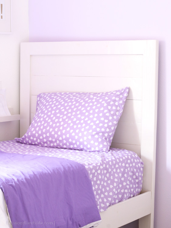 DIY white twin bedframe made from inexpensive pine wood inspired by Pottery Barn Kids Emery bed