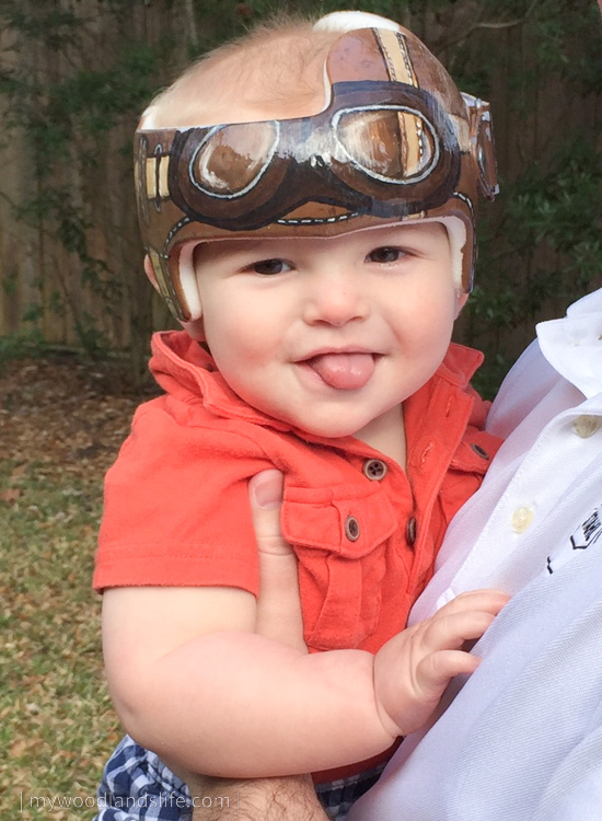 Baby wearing custom painted doc band sealed with epoxy