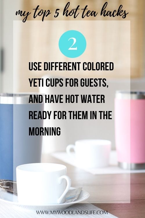 YETI cups on kitchen table with white tea cups next to them