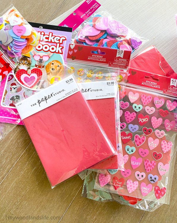 Valentines card making supplies from Hobby Lobby stickers and red cards and envelopes