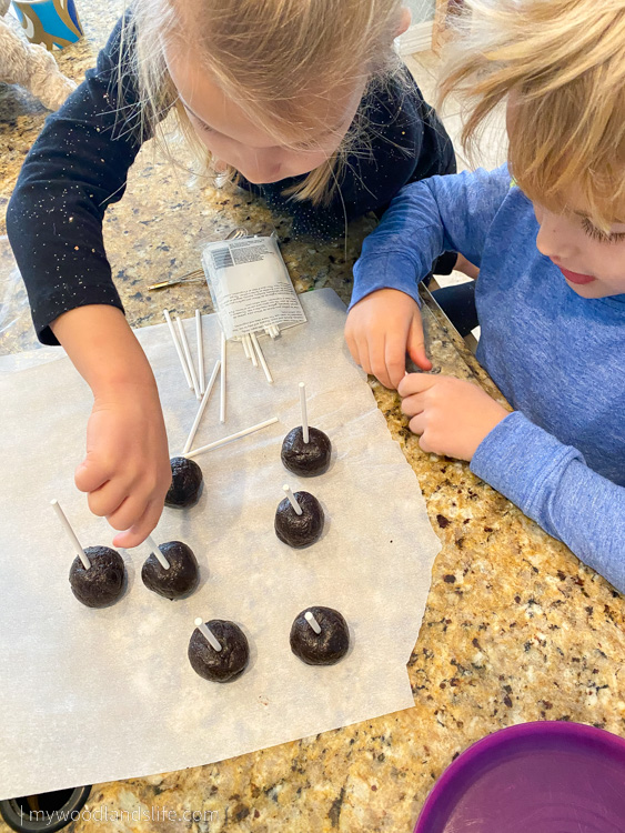 Kids making oreo cake pops for Valentine's Day