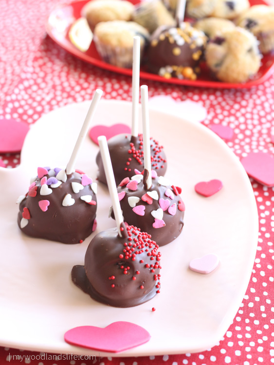 Easy oreo cake pops with heart sprinkles on heart plate for Valentine's Day